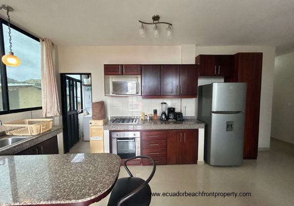 All the necessities available in this functional kitchen.