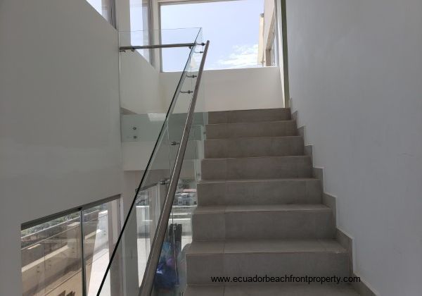 Stairway to 2nd level with master suite