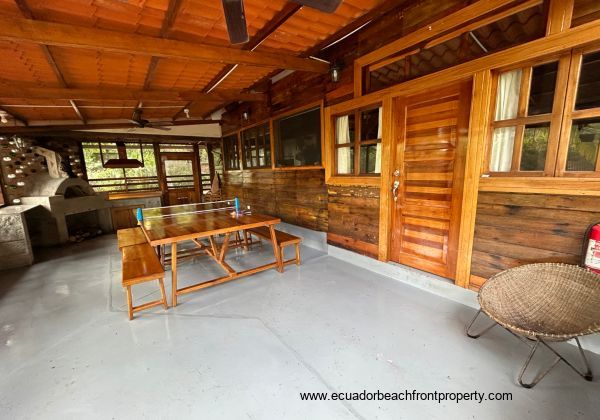 screened-in patio with front entrance