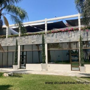 Two garden view apartments with covered parking above 