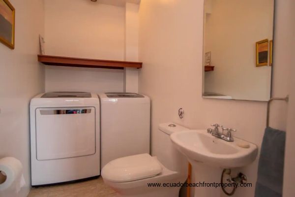 Both villas have their own washer and dryer in the downstairs half bath