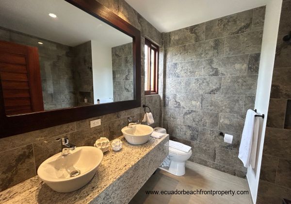 Master ensuite bath with double sinks and walk-in shower