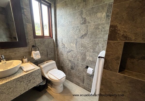 Master ensuite bath with double sinks and walk-in shower