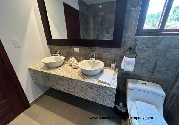 Master ensuite bath with double sinks and walk-in shower