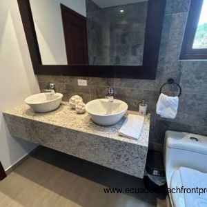 Master ensuite bath with double sinks and walk-in shower