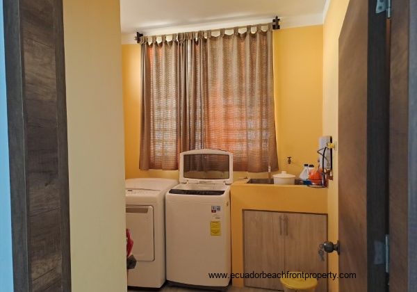 Laundry room with washer, dryer and utility sink