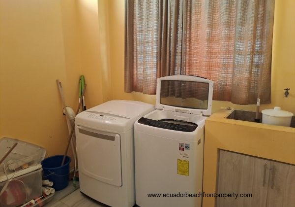 Laundry room with washer, dryer and utility sink