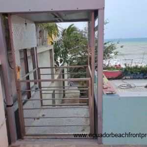 A chair lift between the house and the lower part of the oceanfront yard 