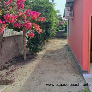 Guest suite exterior with bougainvillea flowers