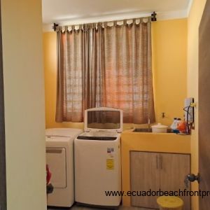 Laundry room with washer, dryer and utility sink