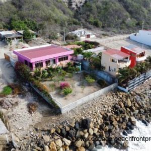 Retaining wall and protective breakwater